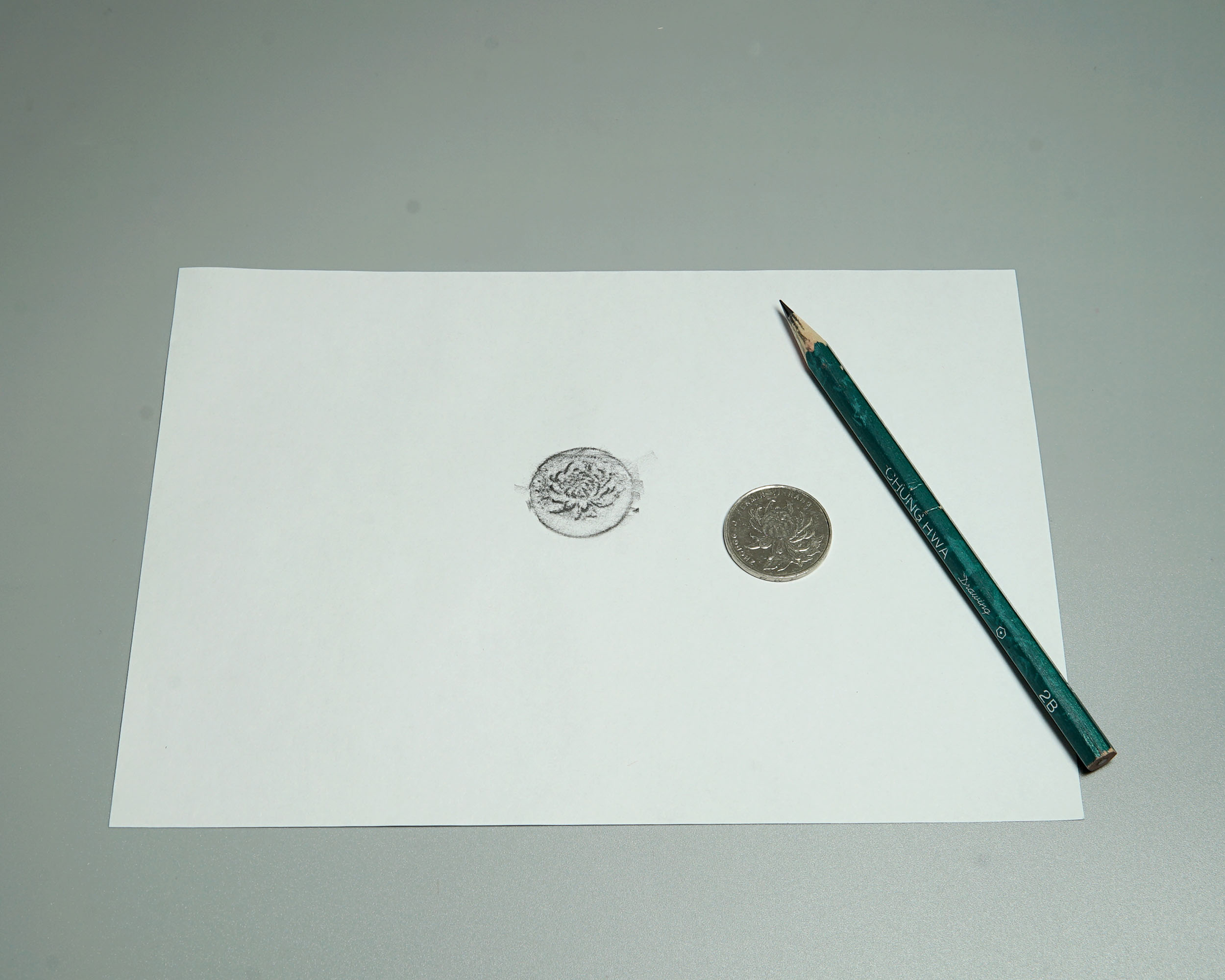 科学小实验大全之让硬币浮现在纸面上