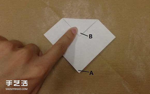 小动物折纸步骤图 用纸折小动物的方法图解 